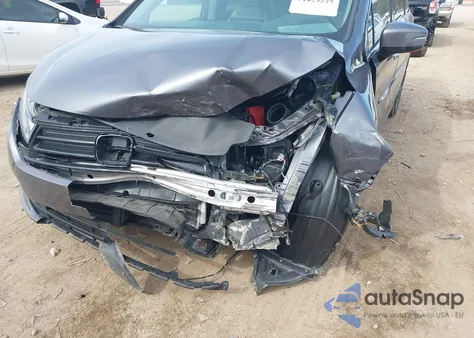 2022 Honda Odyssey Elite z USA, uszkodzony, nr VIN 5FNRL6H9XNB023640